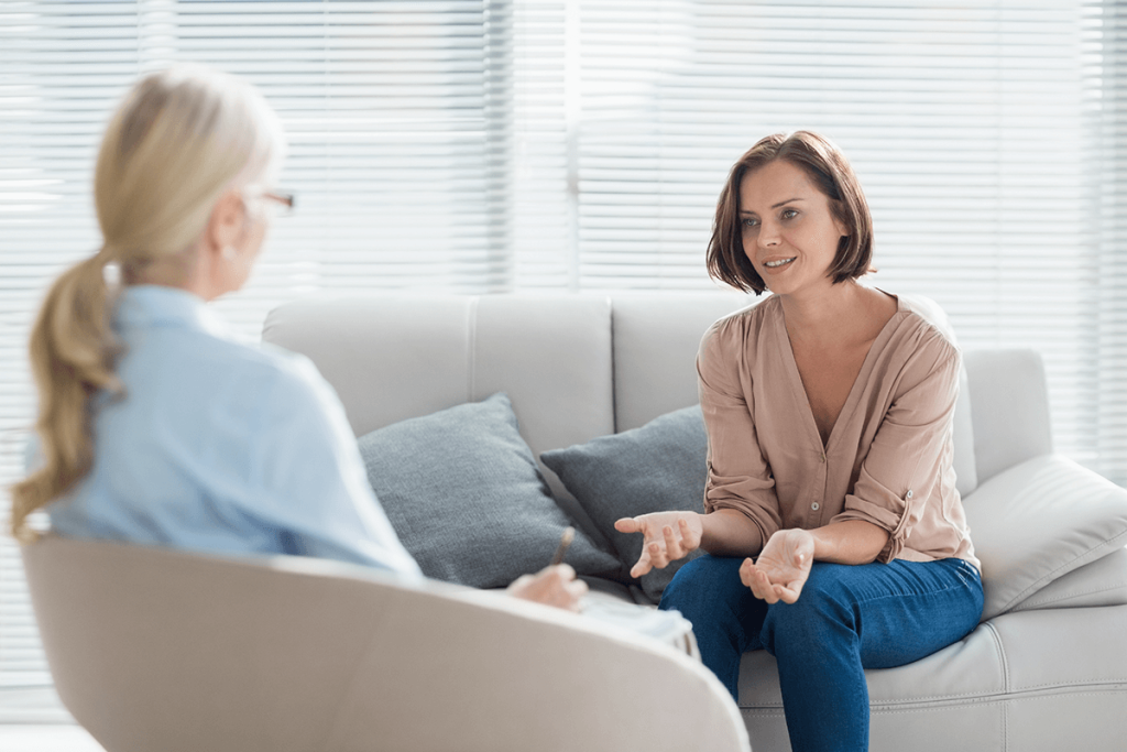 Women talking in therapy office